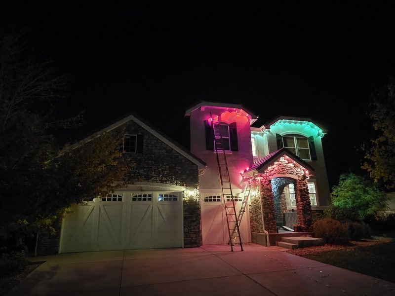 Pink and teal on stone-front home