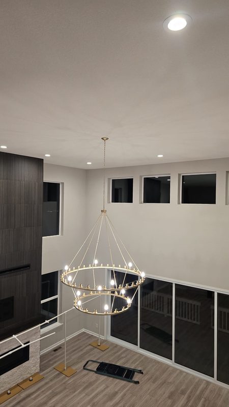 Two-tier chandelier over open loft